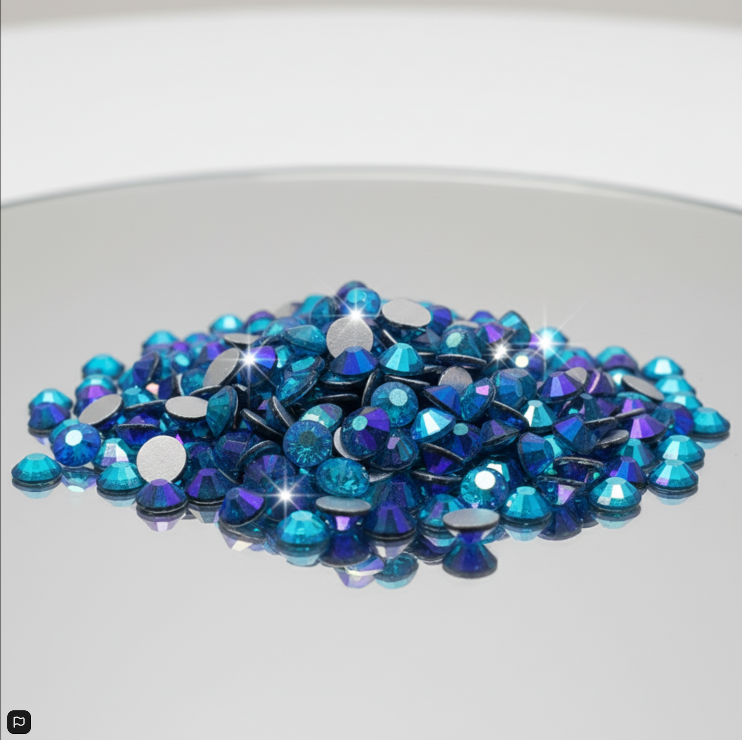 Blue rhinestones on a white background