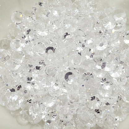 A plate of transparent clear glass rhinestones.